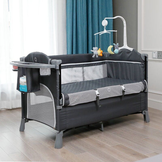 Portable baby crib playpen with wheels and mosquito net.